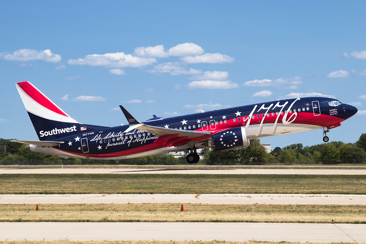 Southwest Airlines Boeing 737 MAX 8, registration N1776R, in the America 250 livery lifting off with the landing gear still down